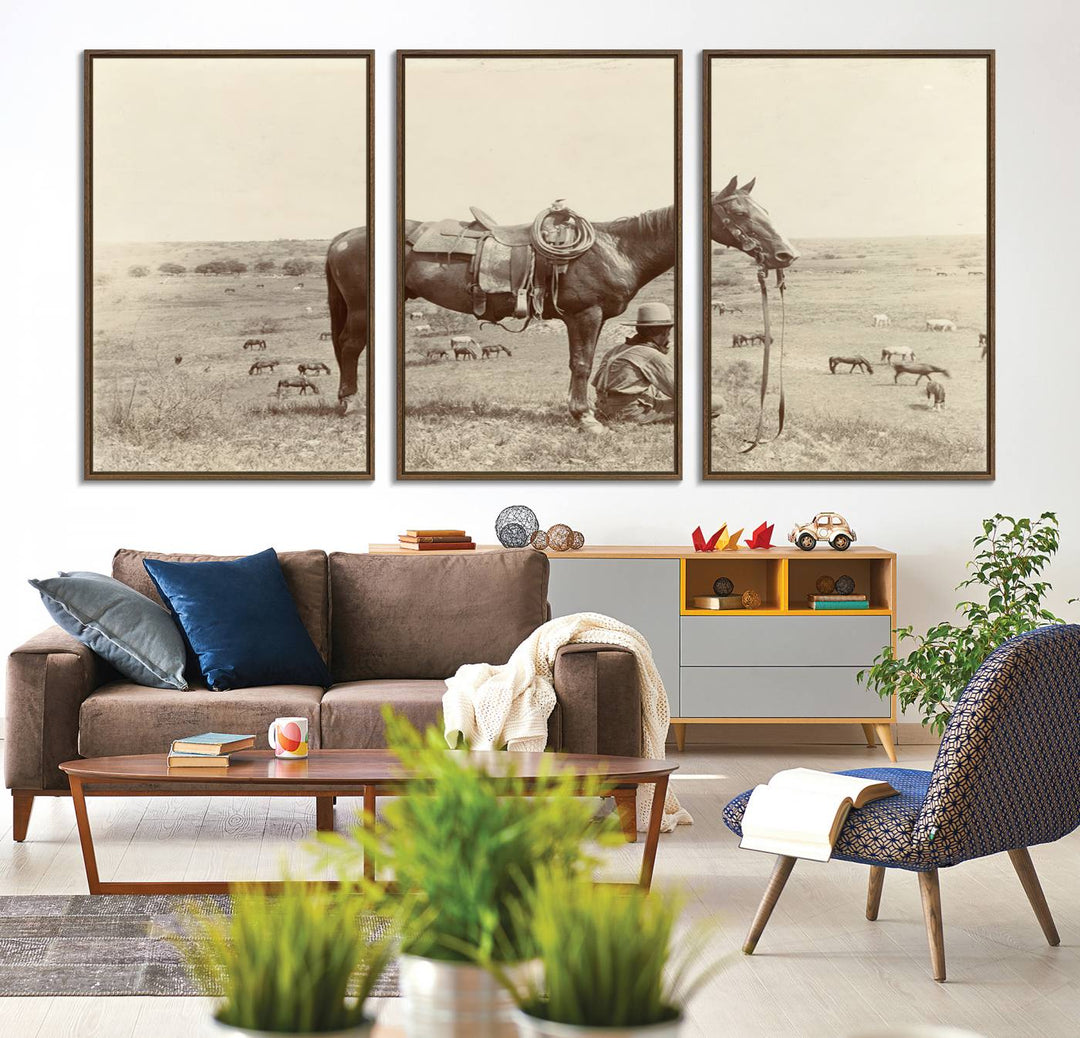 Cowboy Wall Art - Vintage Western Horse Canvas Print features a cowboy kneeling by his horse in a field.