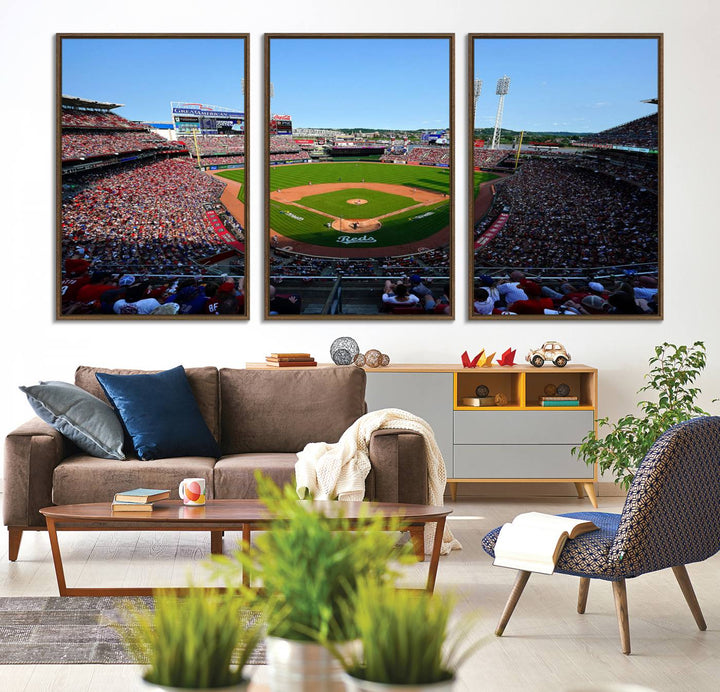 The Cincinnati Reds Baseball Team print of Great American Ball Park Stadium adorns the wall.