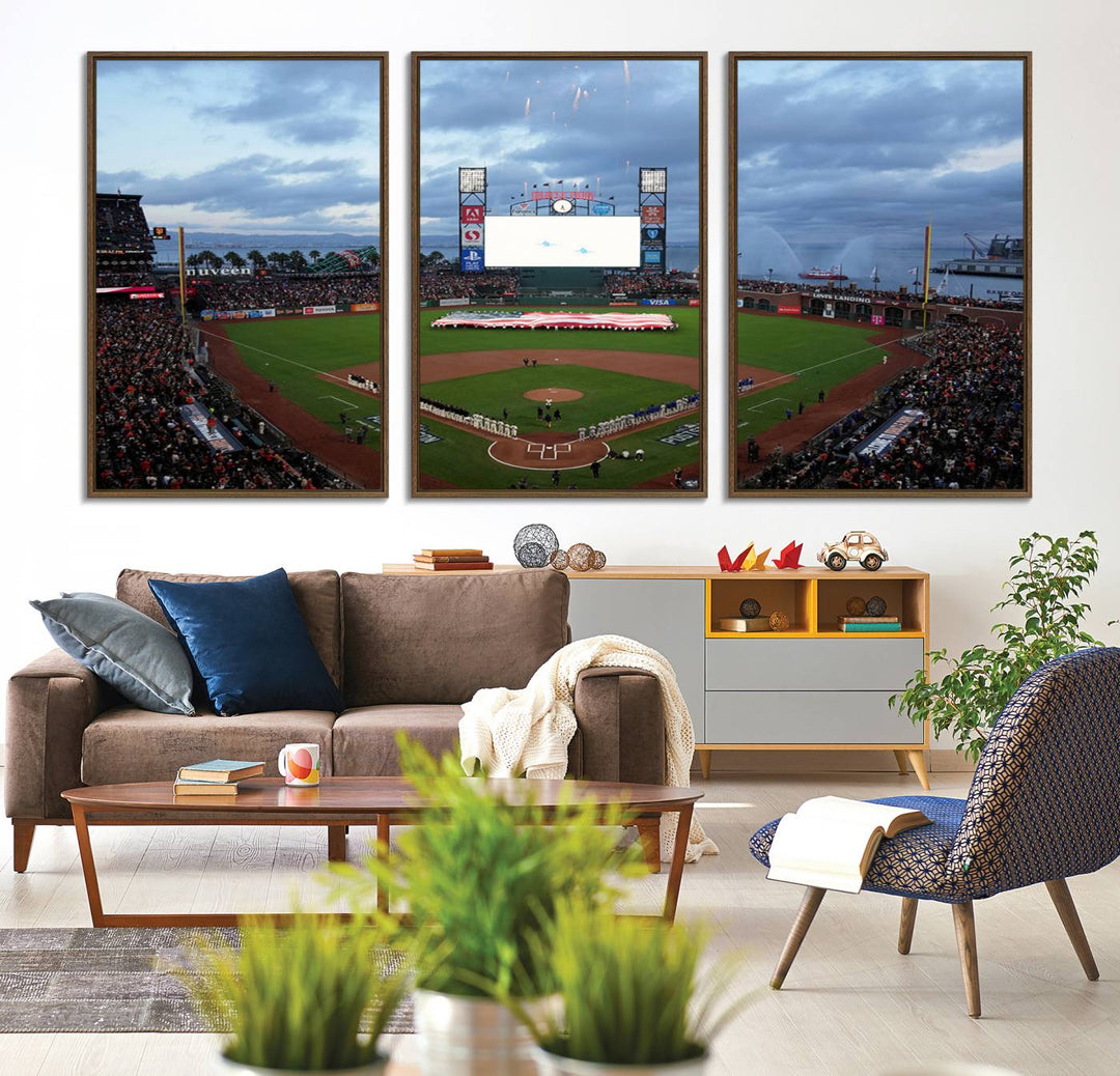 This framed 3-panel canvas MLB wall art features a giant flag and fans under a cloudy sky at Oracle Park.