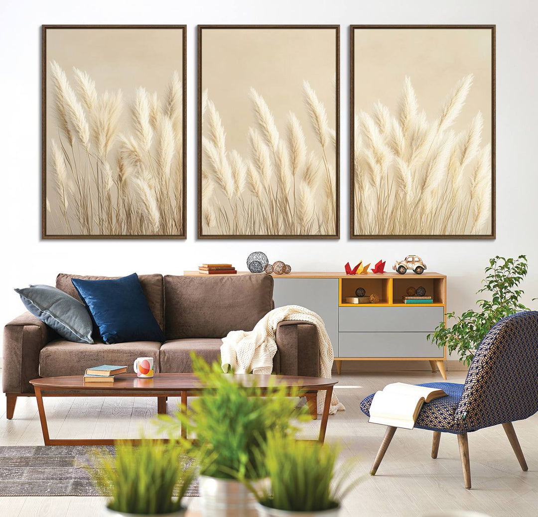 Adorning the wall are three large Grass Wall Art Prints which enhance the space with their boho minimalist aesthetic.