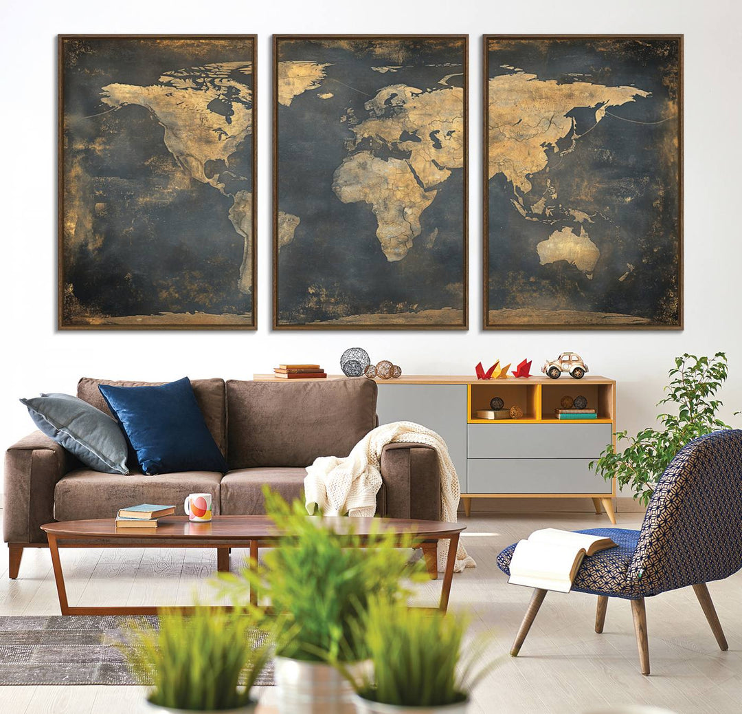 The Grunge World Map Canvas Wall Art features golden tones and is displayed against a white-paneled wall.