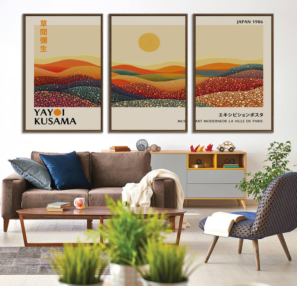 A Yayoi Kusama Wabi Sabi wall art print features abstract hills and a sun.