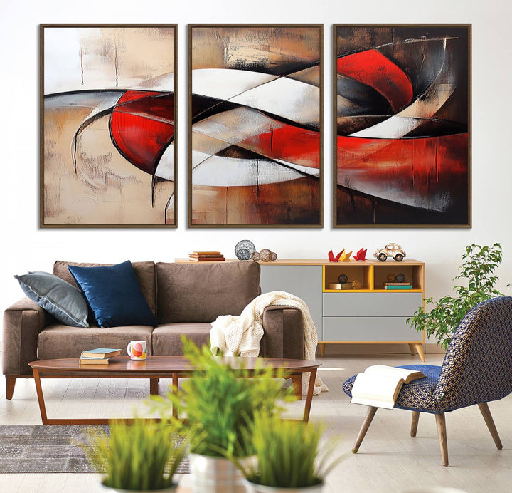 The "Abstract Wall Art - Modern Red and White Canvas Wall Art Print" features bold geometric shapes in red, black, and white on a beige background, enhancing contemporary aesthetics. This canvas print adds a striking focal point to any room, beautifully complementing the modern vibe of the space.