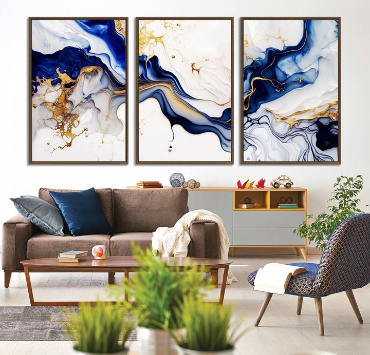 Golden Cascades on Midnight Blue wall art swirls above, featuring gold and white accents.