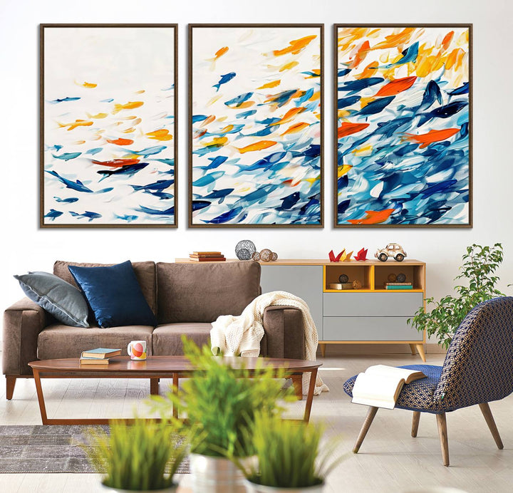 A colorful Abstract Fish Shoal Canvas Print hangs on the wall.