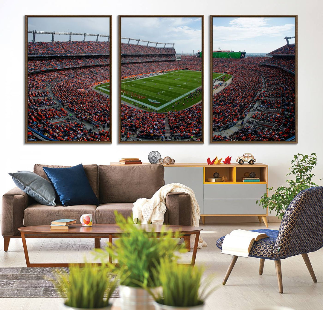 The Denver Broncos Football Print features a vibrant, fan-filled orange stadium overlooking the football field.