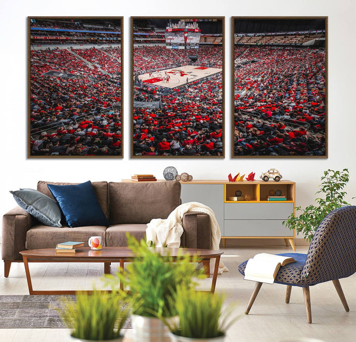 A painting of Louisville Cardinals fans in red at the KFC Yum Center Arena.