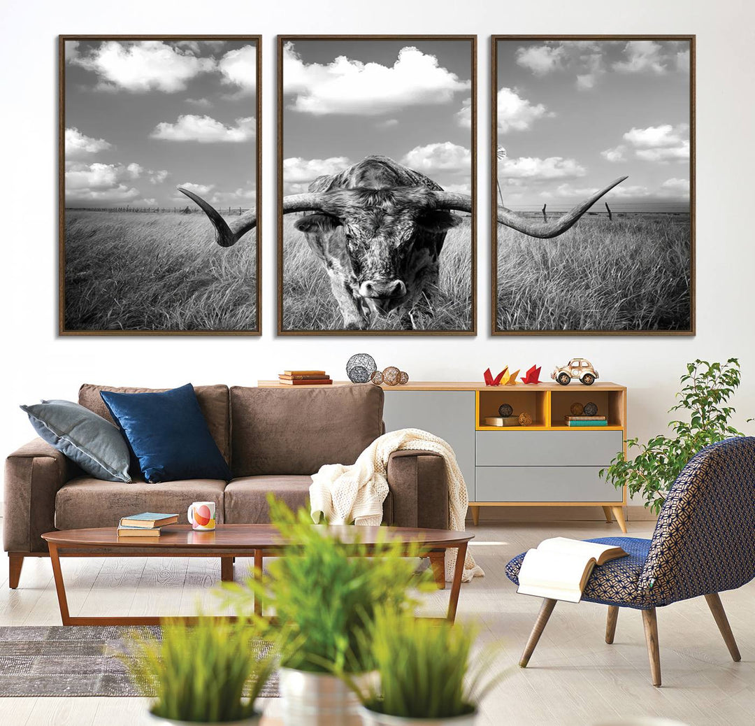 Longhorn Cow Field Canvas Print featuring rustic charm with a windmill backdrop.