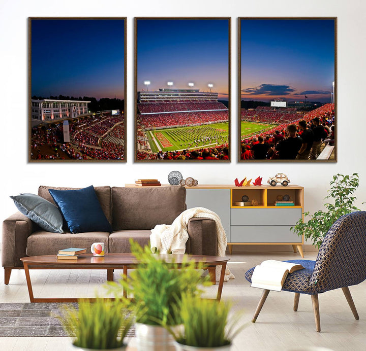 The Wolfpack Football Team Print captures a band and crowd at dusk in a premium canvas art style at Raleigh Carter-Finley Stadium.