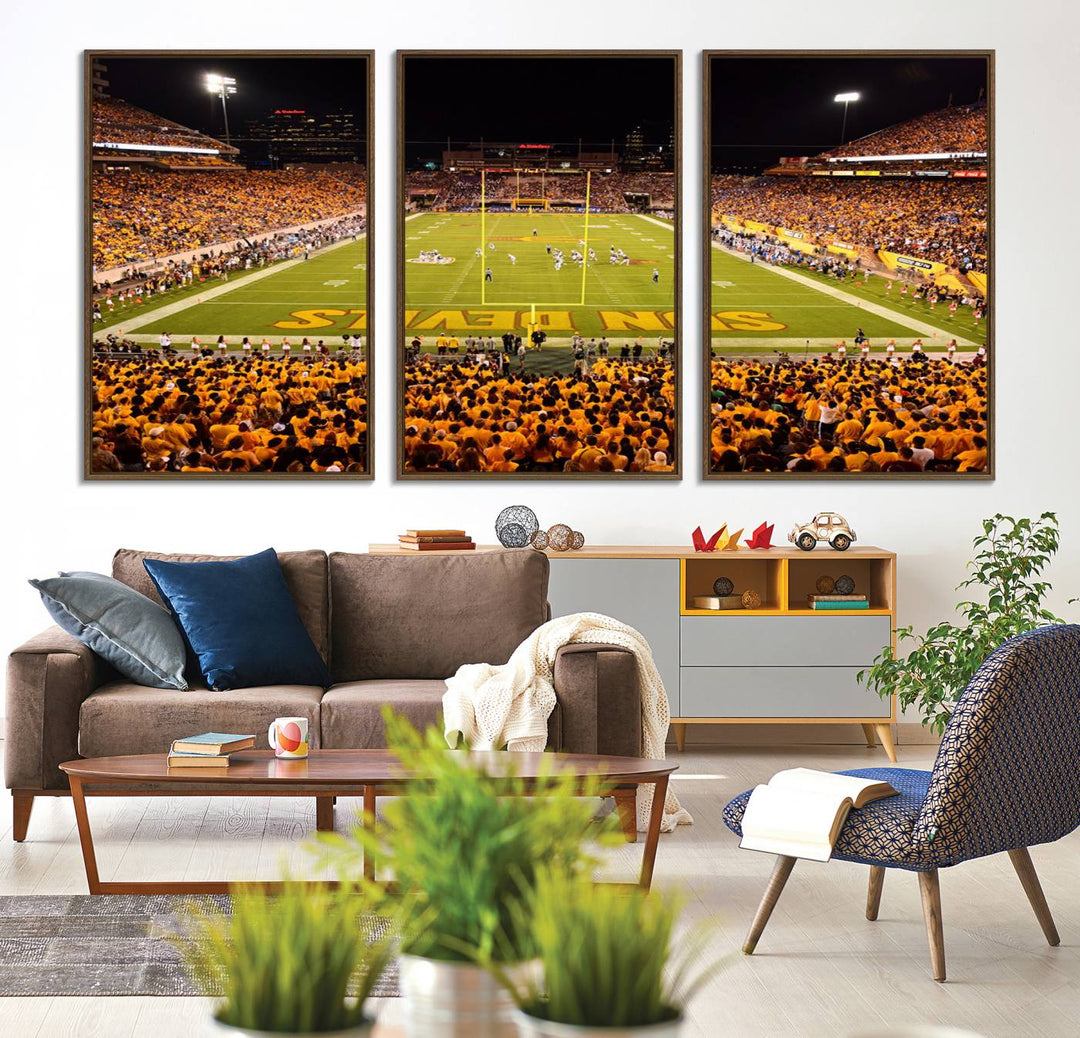 The Phoenix Stadium Canvas Wall Art features a vibrant depiction of a packed stadium filled with ASU Sun Devils fans wearing yellow shirts.