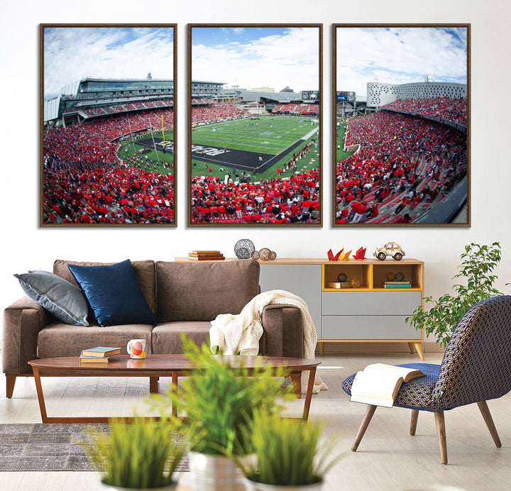 The wall showcases a Nippert Stadium canvas print of the Cincinnati Bearcats.