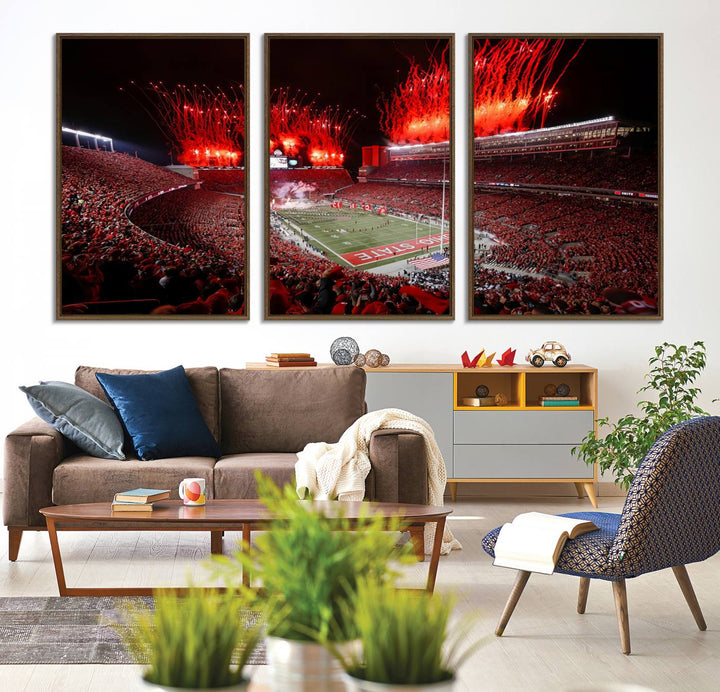 A vibrant red canvas art of a packed Ohio State Buckeyes stadium at night with fireworks.