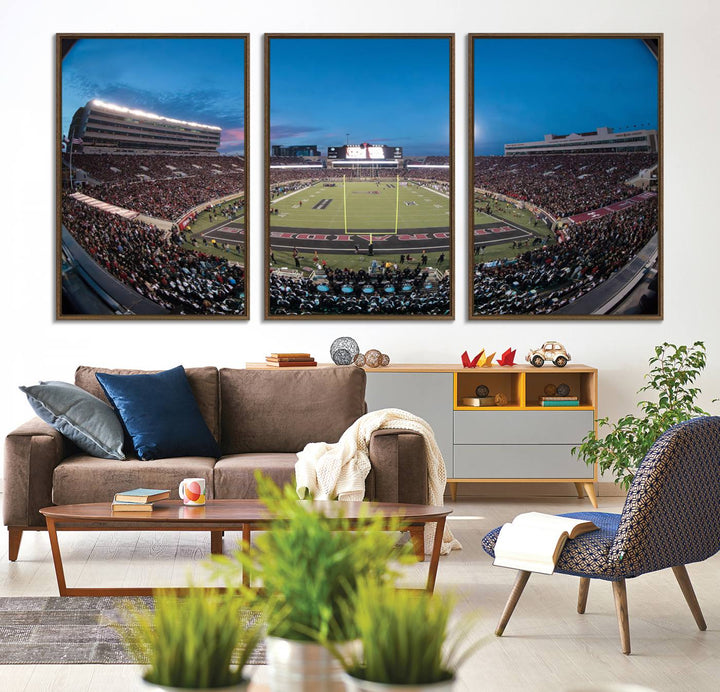 The wall art in the living room features a Texas Tech Red Raiders Football Team Print, showcasing Jones AT&T Stadium at dusk.