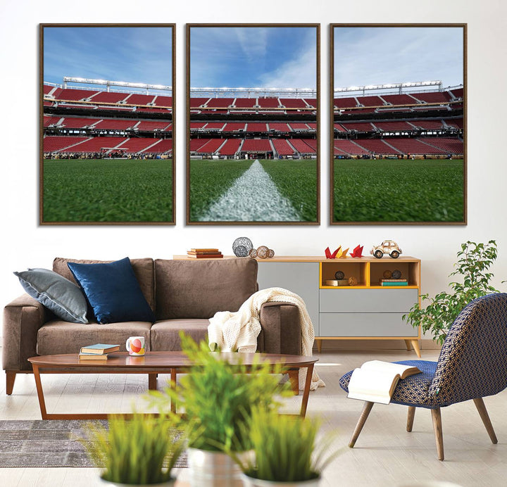 A canvas print of the University of Tulsa Golden Hurricane showcases H.A. Chapman Stadiums football field and red seats against a backdrop of a blue sky.