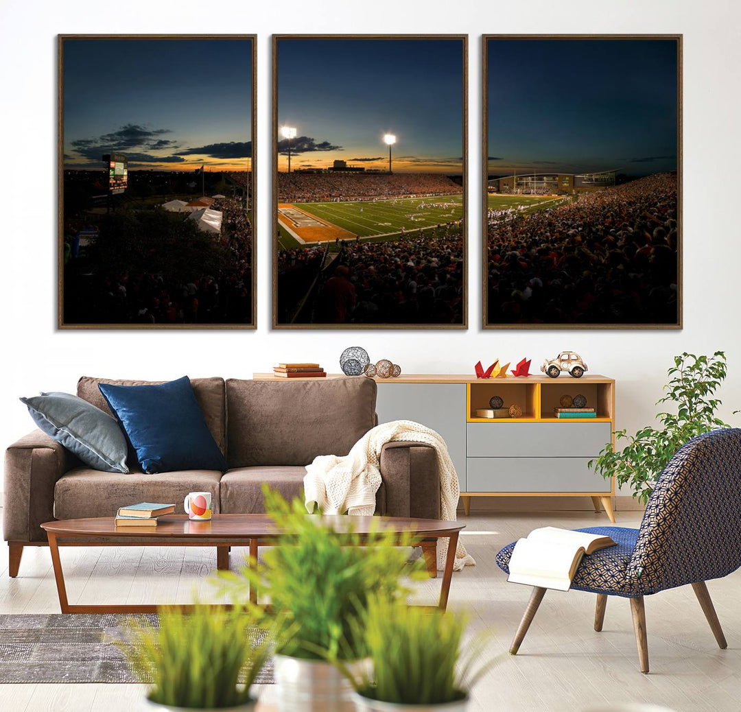 Ball State Cardinals Football Team Print - Muncie Scheumann Stadium Canvas featuring a sunset, floodlights, and lively crowd.