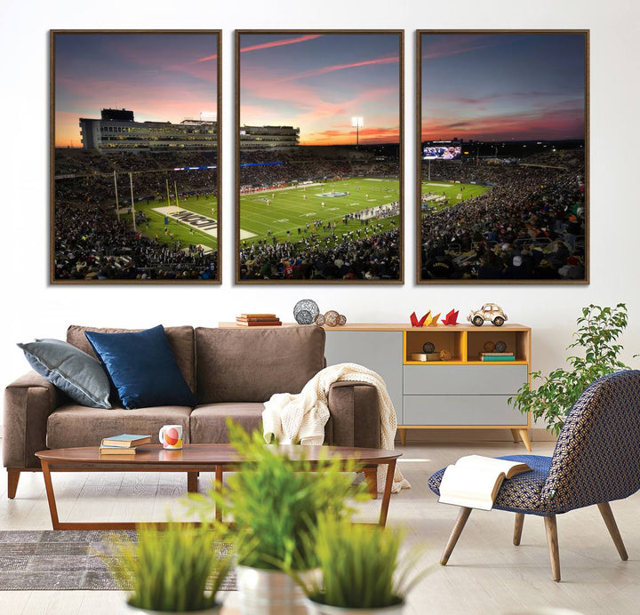 This wall art canvas print captures UCONN Huskies fans energizing a sunset scene at East Hartfords Pratt & Whitney Stadium.