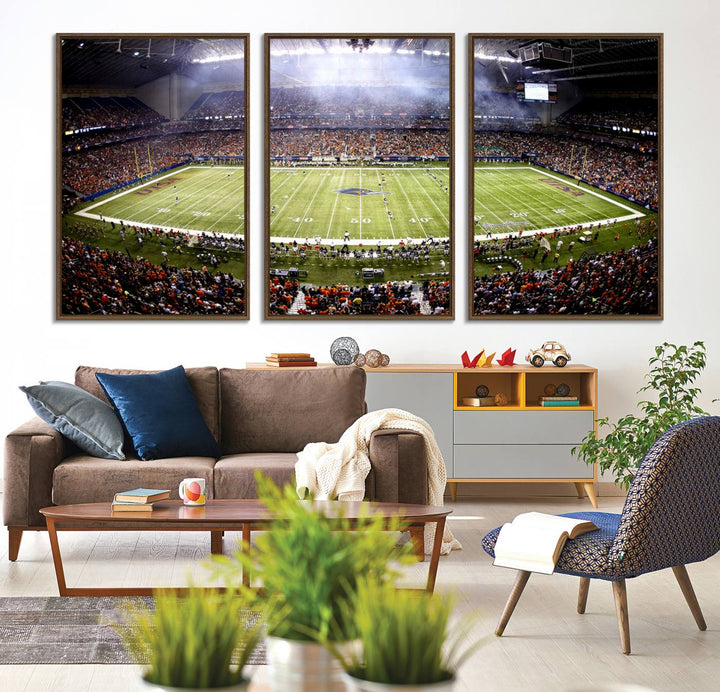 The modern living room features an Alamodome wall art canvas print, depicting a stadium filled with spectators for a UTSA Roadrunners game.