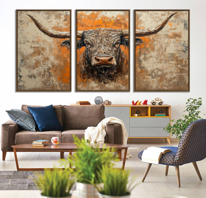 Abstract Cow Longhorn Bull Wall Art presents a detailed face centered on a textured orange and beige background.