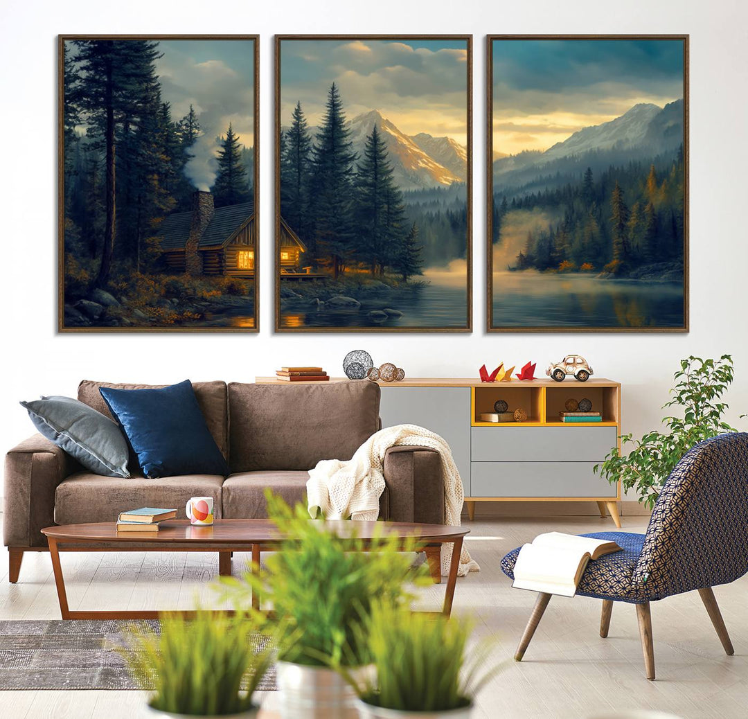 Serene sunset lake wall art: a cozy mountain cabin with lights, framed by pine trees and set against a moody sky. Ideal for adding rustic lodge charm to your space.