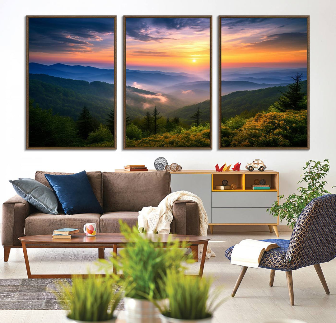 The Majestic Mountain Sunrise Print features a vibrant sky, layered hills, and evergreens, making it a stunning piece of wall decor.