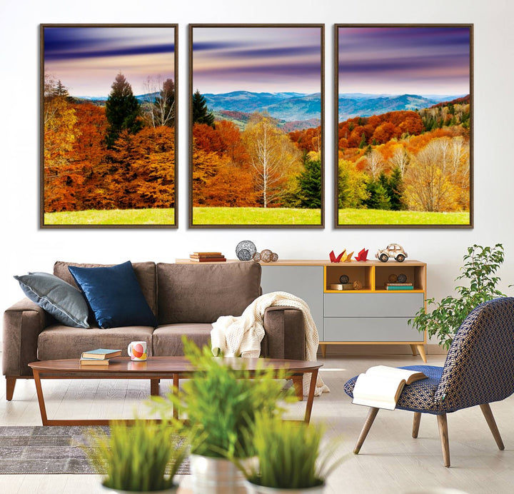The wall art in the kitchen dining area is a large Autumn Forest Mountain Canvas Print that captures a vivid scenic landscape.