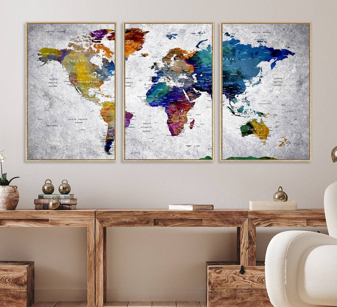 The World Map Art Canvas Print, featuring country names on a grunge-stained gray background, is perfect for stylish home decor.