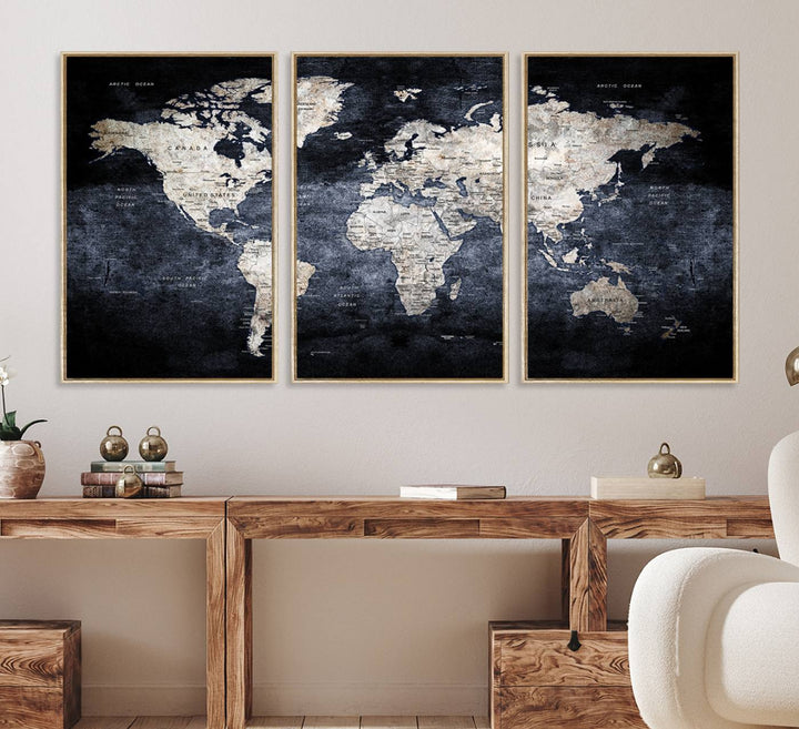 Rustic Black and Bronze World Map Canvas Triptych features white continents on a grunge-stained background.