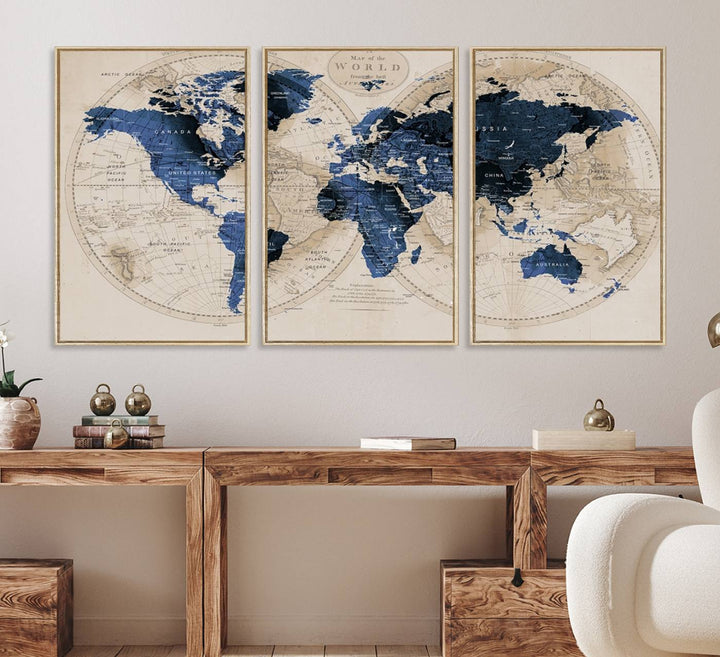 The Vintage Triptych Map Print is a grunge-stained blue and beige world map, perfect for enhancing wall decor.