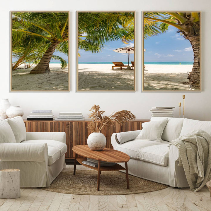 The canvas art print titled Lounge Chairs Palm Trees on Tropical Beach offers free shipping.