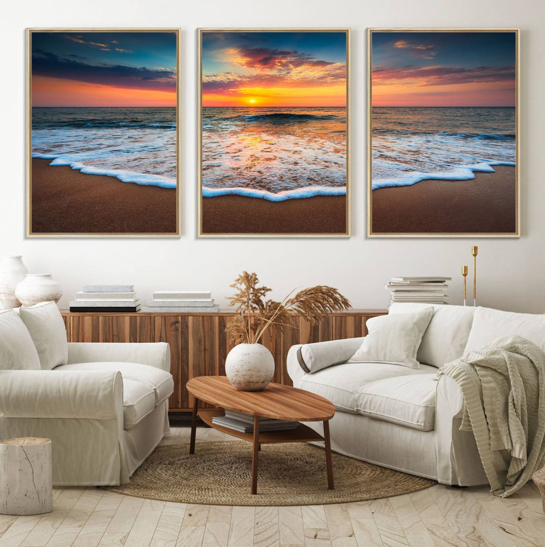 A Sunset with Calm Waves on the Beach Wall Art Canvas Print adorns the dining room.