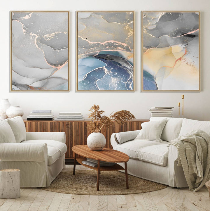 Gray Marble Fluid Effect Abstract Canvas with swirls of gray, gold, and blue.