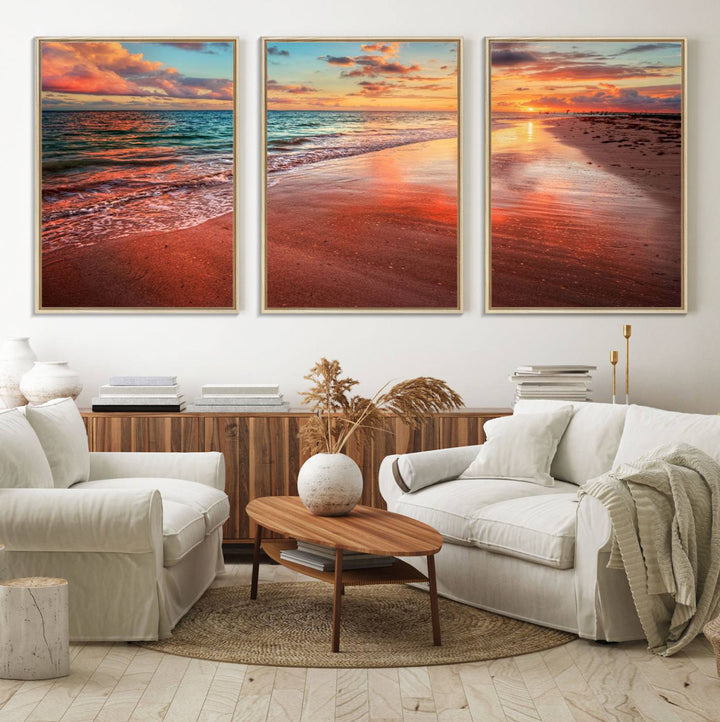 A Vibrant Sunset Beach Canvas Print with ocean waves and sandy shoreline enhances coastal-themed interiors.