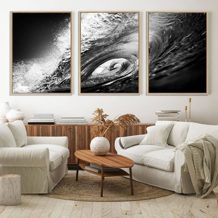 The Black Ocean Wave at Sunset Canvas Art hangs on a grey wooden wall.