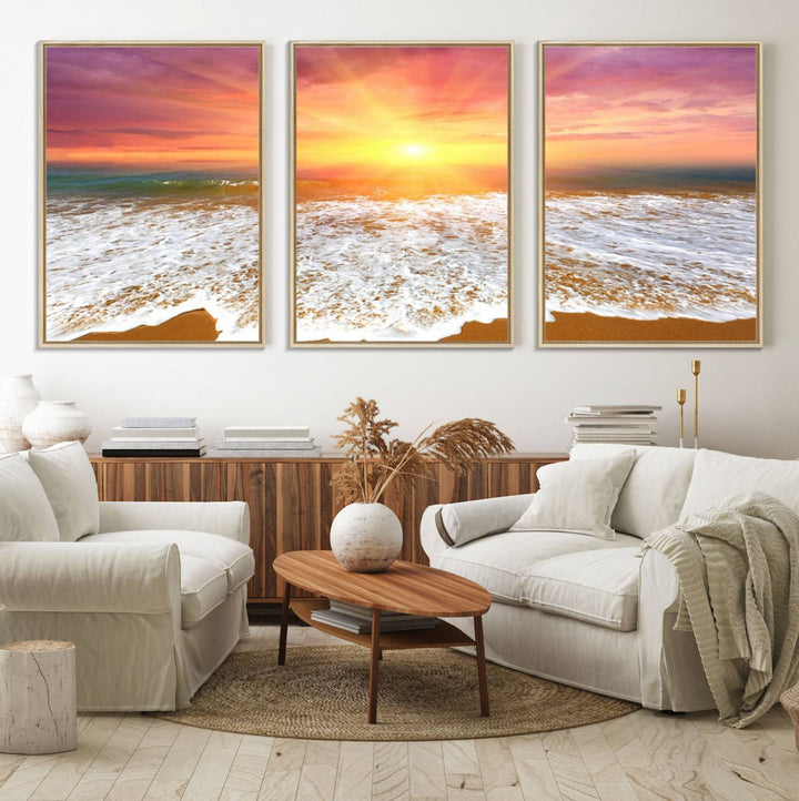 Golden Beach Sunrise 3-panel canvas art of ocean waves, hung on a wooden wall.