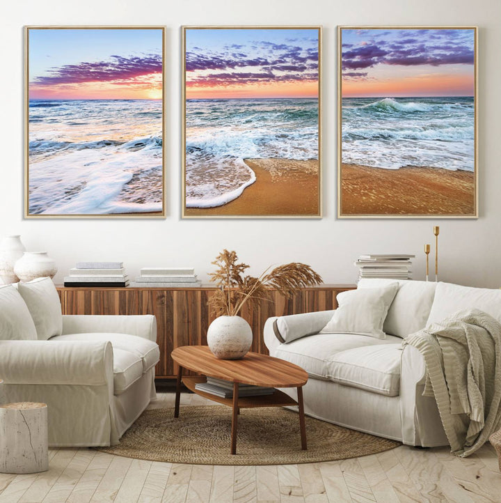 The Vivid Sunset Ocean Waves Triptych hangs on a wooden wall.