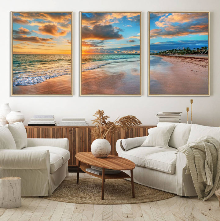 A wall displays Sunset Ocean Waves on Tropical Beach 3-panel canvas art.