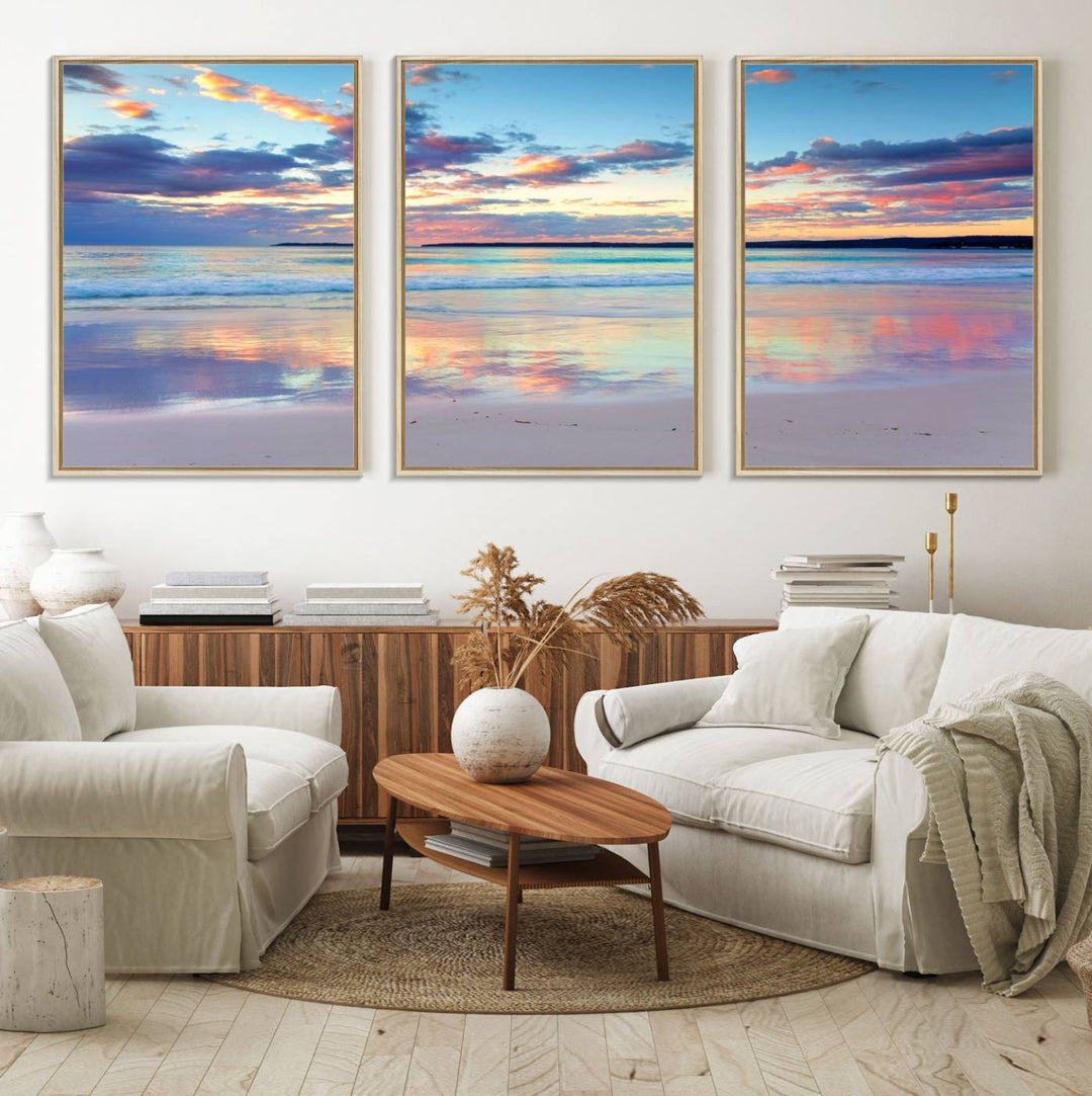 The Tranquil Pastel Sunset Beach Triptych Canvas Art hangs, showcasing its serene beauty.