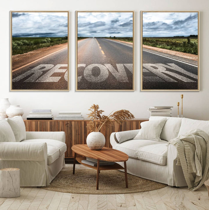 The Recovery Road Wall Art Canvas Print depicts a road under a cloudy horizon.