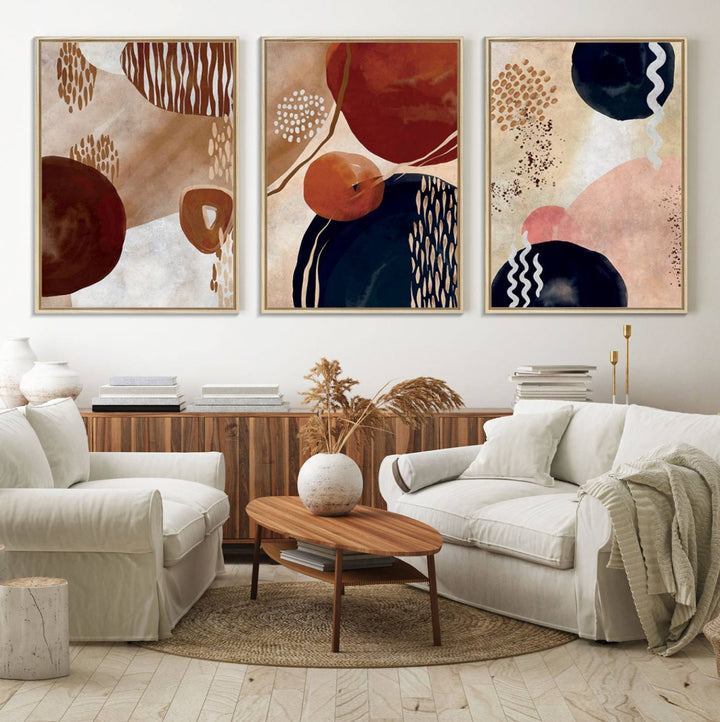 The Boho Neutral Canvas Print Set with earthy tones and circles hangs on the wall.