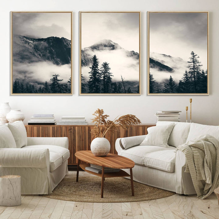 A large foggy mountain forest canvas print hangs prominently in the room.