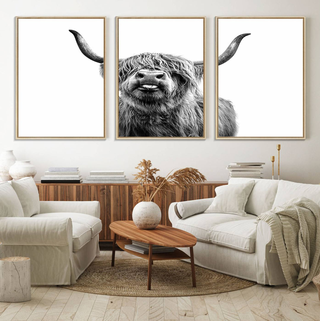 The Fanny Highland Cow art print decorates the modern kitchen, featured in black and white.