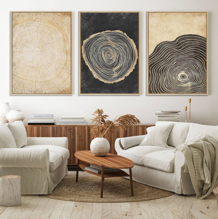 Tree Rings Canvas Wall Art Print hangs prominently in a modern kitchen.