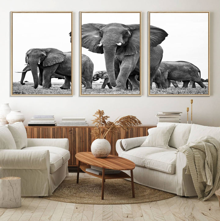 A modern dining area features a Black White Elephant Family Wall Art Canvas Print.