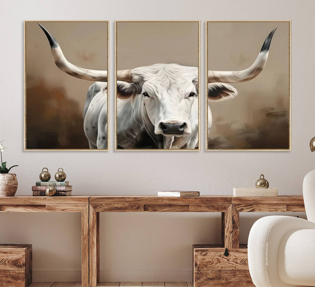 The kitchen features a striking canvas print of a Longhorn Bull.