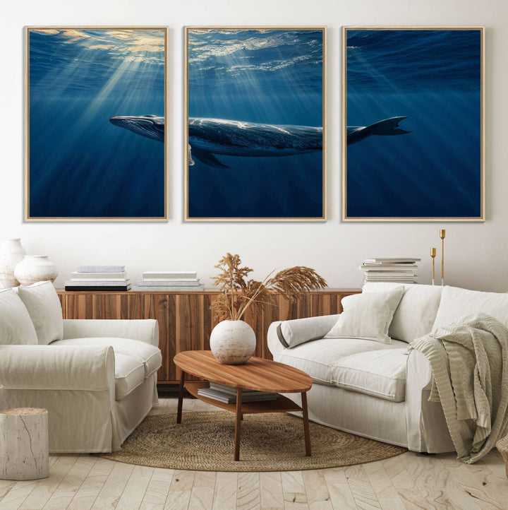 The Whale under Ocean wall art canvas print graces the white wall.