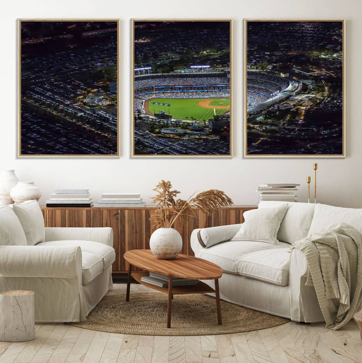 A large Los Angeles Dodgers print of Dodger Stadium at night is displayed near a window.