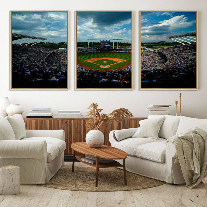 A 3-panel print of Kauffman Stadium, showcasing a crowded baseball field under cloudy skies.