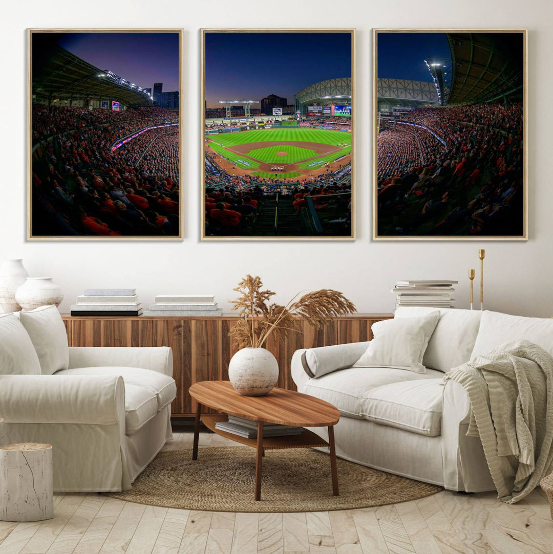 A canvas print of Houston Minute Maid Park at dusk is mounted on the wall.