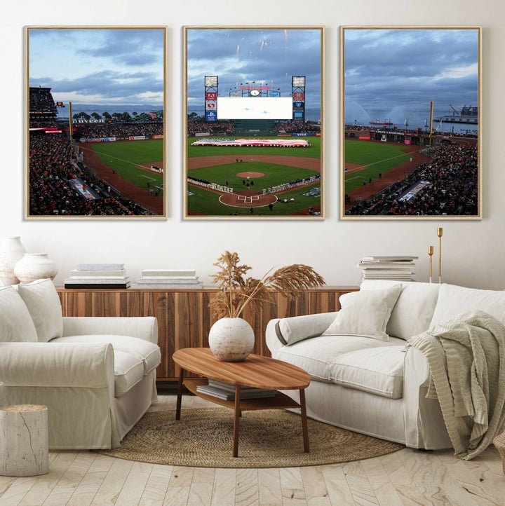 This framed 3-panel canvas MLB wall art features a giant flag and fans under a cloudy sky at Oracle Park.