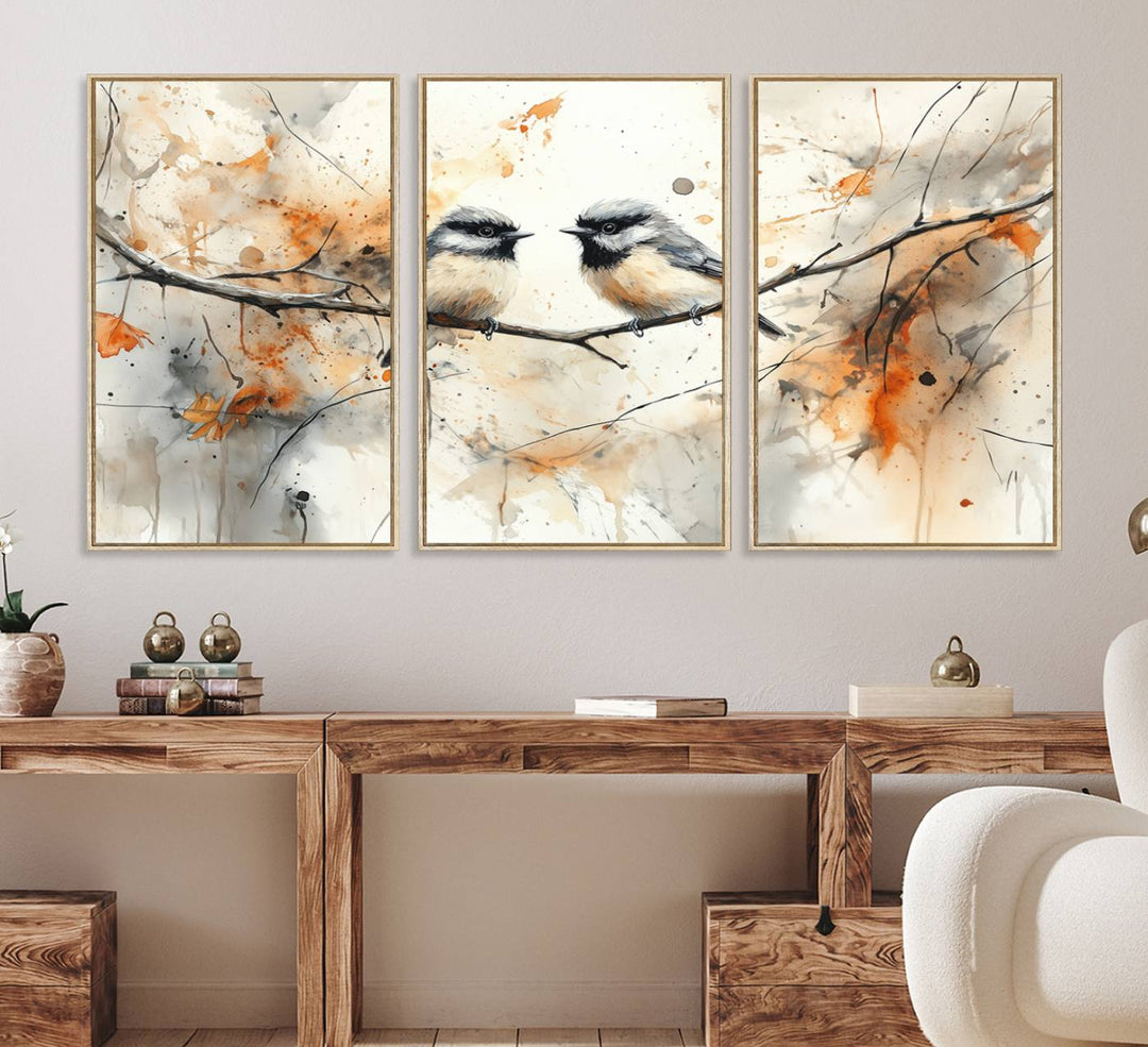 The living room features abstract watercolor chickadee bird art on the wall.